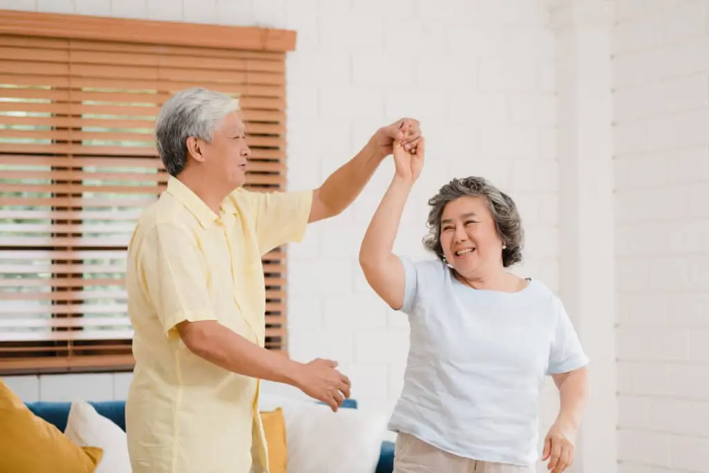 Stay Safe and Healthy This Summer Storm Season! 15 asian elderly couple dancing together while listen music living room home sweet couple enjoy love moment while having fun when relaxed home scaled